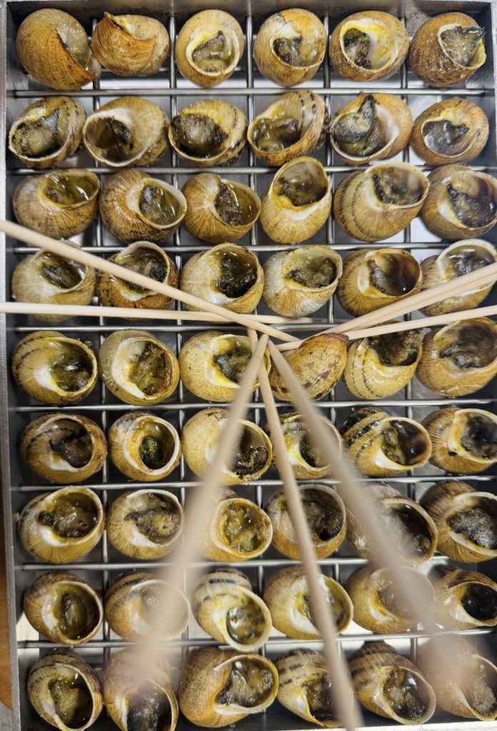 Lumache in teglia, piatto tipico de La Lumaca d'Oro in Umbria