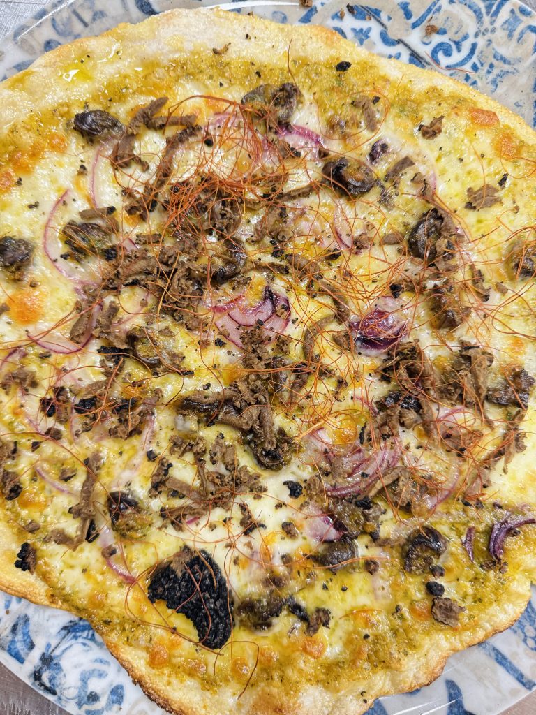 Pizza alle lumache, specialit├á de La Lumaca d'Oro a Bevagna